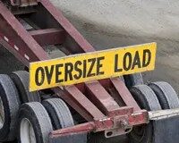 How to attach a vehicle to a flatbed trailer